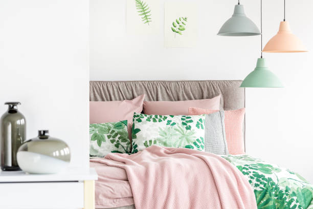 istock Pastel bedroom with lamps 1219115473