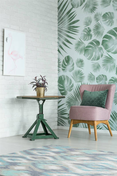 istock Green table in floral room 1219115603