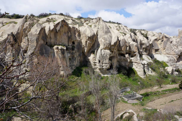 landscape of fairy chimney and stone mountain in Goreme, Cappadocia Beautiful unique landscape of fairy chimney and stone mountain in Goreme, Cappadocia Goreme stock pictures, royalty-free photos & images