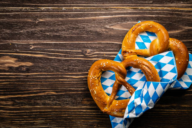 October fest concept - traditional food and beer served at event October fest concept - traditional food and beer served at event, wood background weisswurst photos stock pictures, royalty-free photos & images