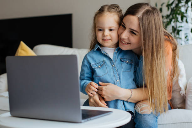 istock Mother and daughters having fun 1219118383