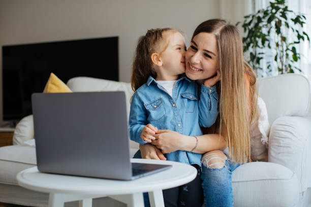 istock Mother and daughters having fun 1219119142