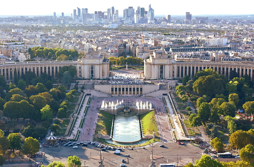 Paris, France. Elevated view of Trocadero, Bois de Boulogne and La Defense financial district with sunset light.
