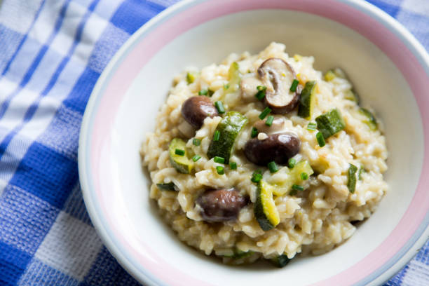 istock Italian Risotto with mushrooms and zucchini 1219121936