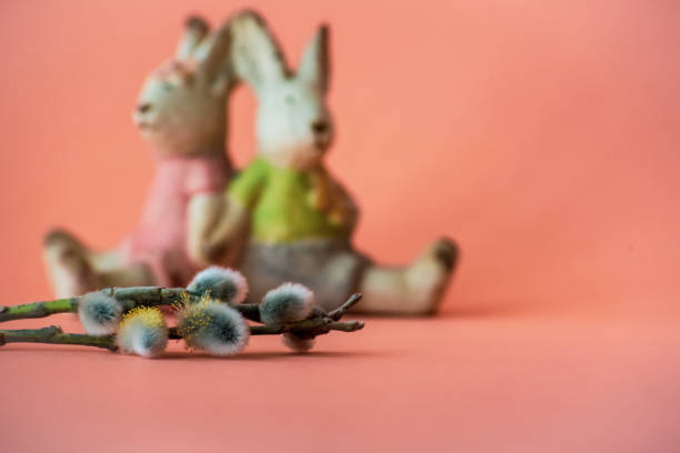 istock Pussy willow twigs and two easter bunnies 1219122546