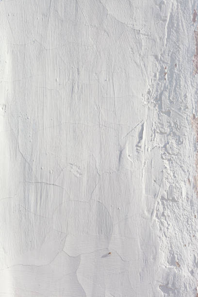 istock Texture of old white concrete wall for background 1219122801