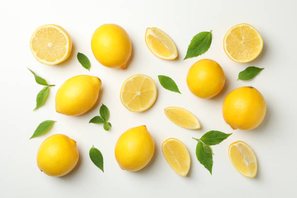 istock Flat lay with lemons on white background. Fresh fruit 1219123594