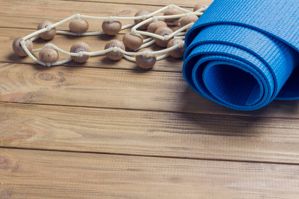 istock Blue training mat and massager with wooden castors. 1219124505