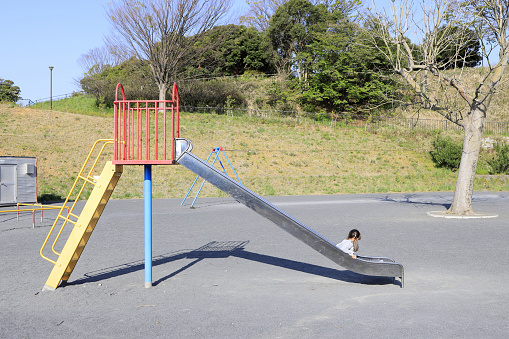 Japanese girl on the slide (5 years old)