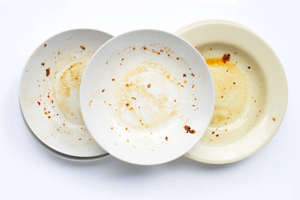 istock Dirty dishes on white background. 1219127895