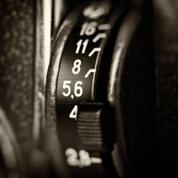 istock Aperture switch on retro movie camera 1219128786
