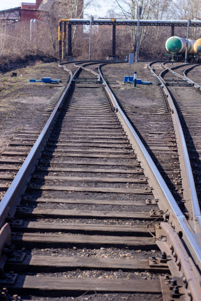 istock Long rails close - up. Railway. The wooden sleepers. 1219132111