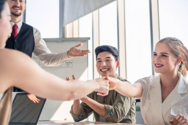 istock Group businessman and team work brainstorm to solve problem and presentation new idea. People have big deal on new challenge topic meeting room. Business finance and communication planning concept. 1219132745