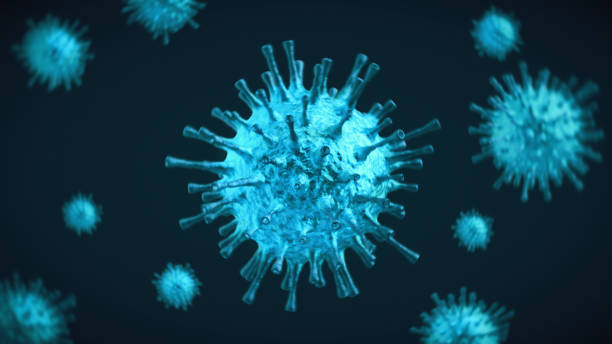 istock Blue magnified and defocused coronavirus design cells on dark background 1219133561