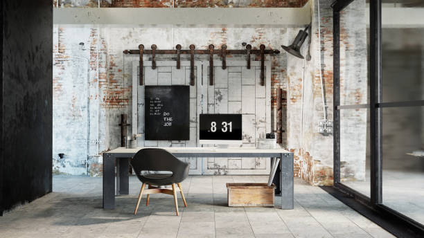 istock Metal office desk with computer in industrial style interior 1219135503