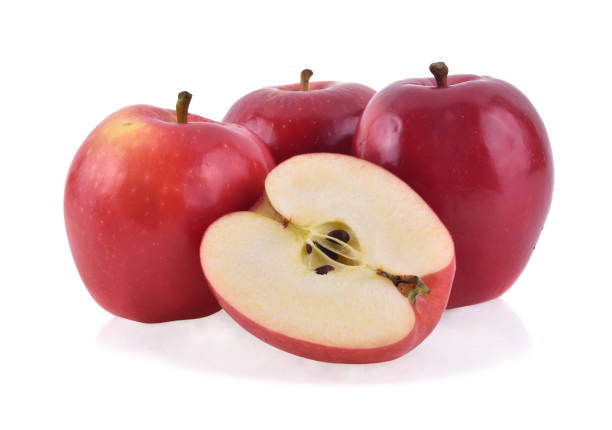 istock pink lady apples isolated on white background 1219135594