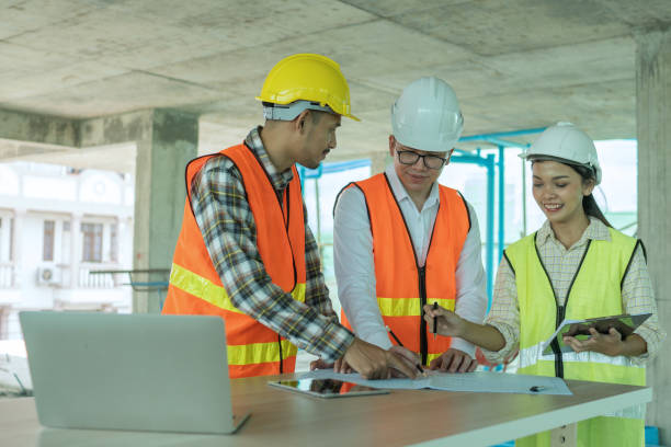 istock Engineer and worker planning for construction building and renovate in working site 1219135899