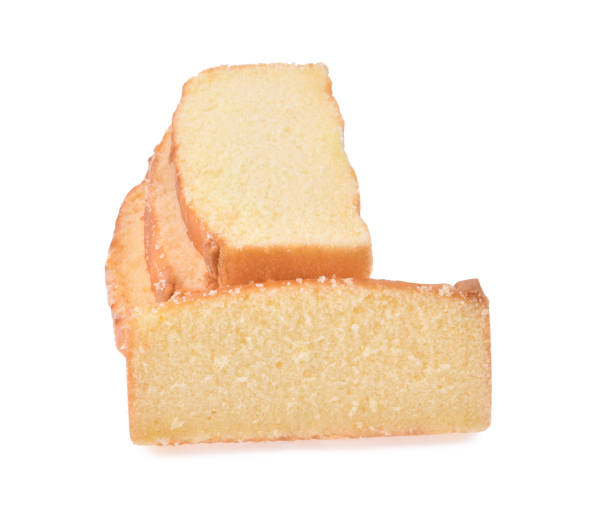 istock Sliced butter cake on white background 1219138464