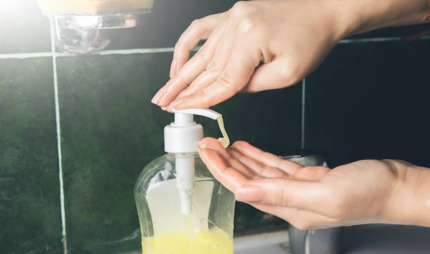 istock liquid soap with woman 1219141499