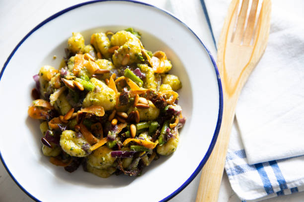 istock Gnocchis with vegetables and pesto 1219142329