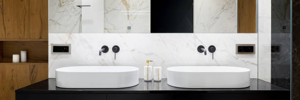 istock Elegant bathroom with two washbasins, panorama 1219150111