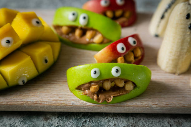 istock Halloween kids party food - sweets on rustic background 1219151166