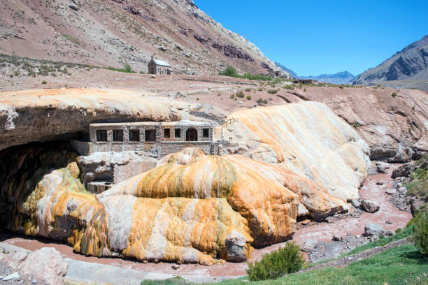 istock Rock formation in the desert and an old building on it 1219151574