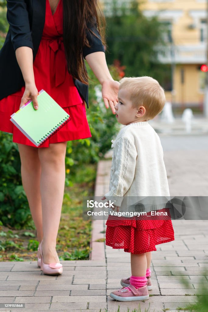 Working mom on maternity leave Working mom on maternity leave. Mompreneur. Mom in beautiful style. Female happiness. Busy working day. Modern business lifestyle. Freelance. Family leisure Mini Skirt Stock Photo