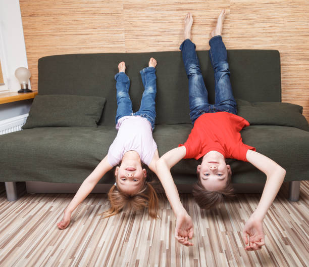 istock Siblings losing they mind locked in at home during self-isolation 1219155961