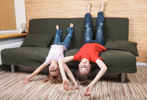 istock Siblings losing they mind locked in at home during self-isolation 1219156009