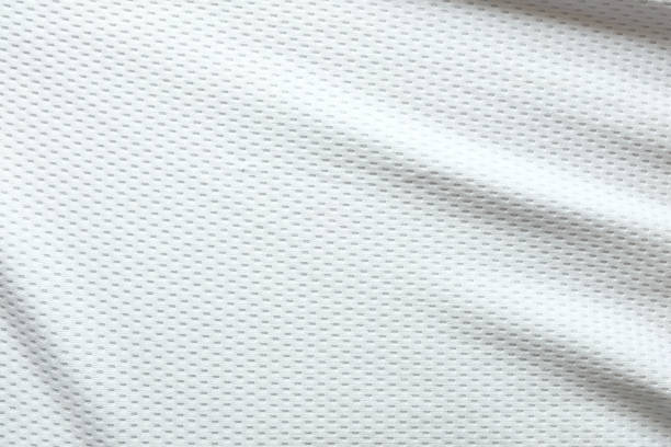 istock Selective focus, White mesh fabric background. cloth sport wear texture for exercise. light weight, good air flow, cool and easy to dry from sweat. abstract wallpaper with copy space for text. 1219159126