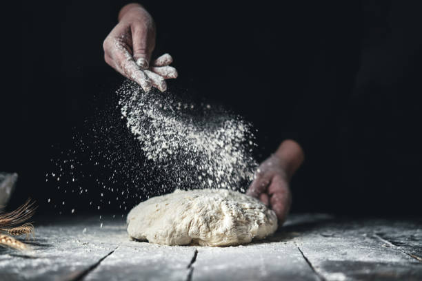 kneading bread dough with hands - pastry crust imagens e fotografias de stock
