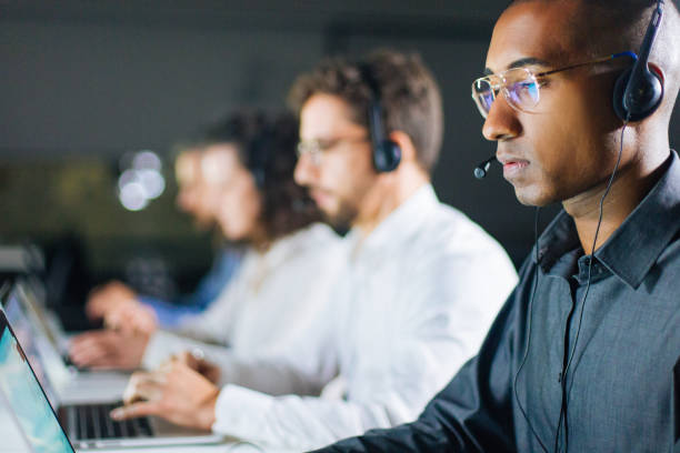 istock Concentrated African American call center operator working 1219160852