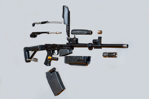 Details of firearms in disassembled condition. Levitation.