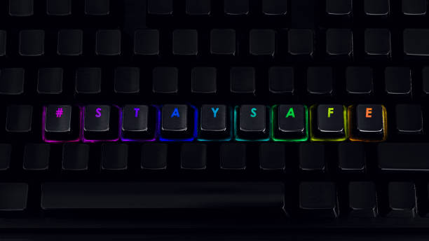 istock Stay safe - Written on RGB backlit keyboard, closeup 1219161801