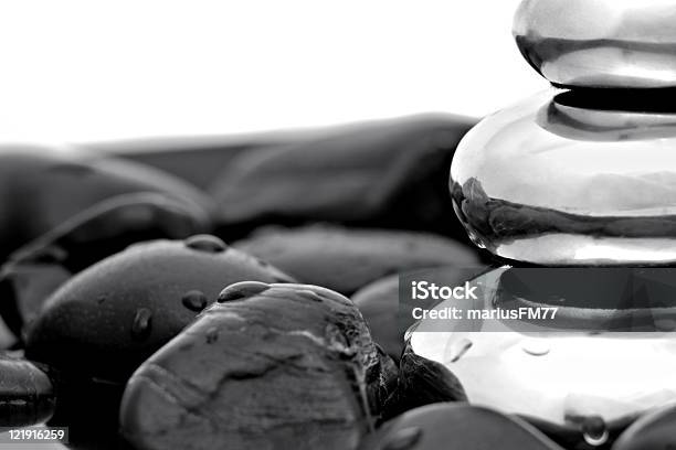 Metal Stack And Stones Stock Photo - Download Image Now - Abstract, Balance, Black Background