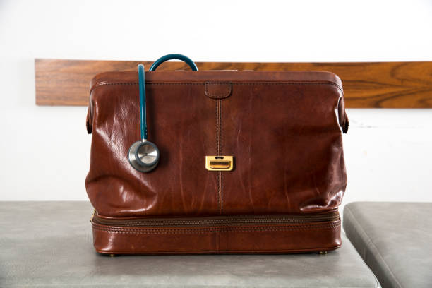 a doctor bag with  stethoscope stock photo