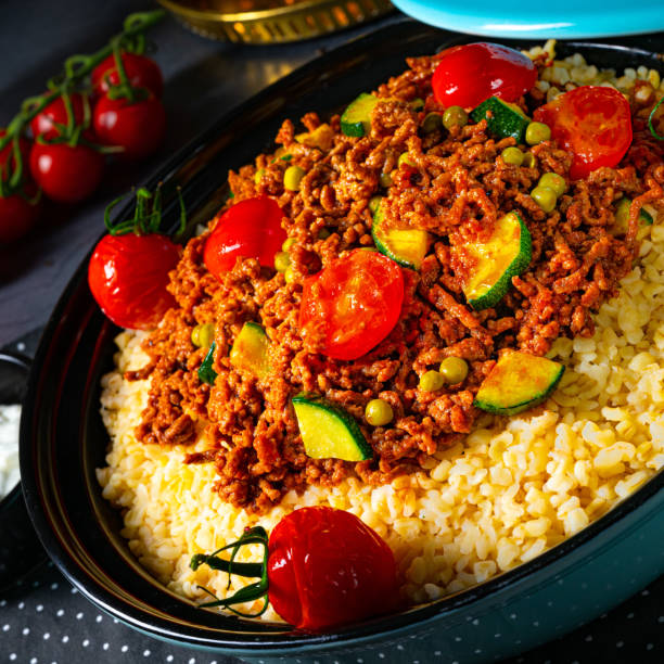 istock Tomato bulgur with vegetables and minced meat 1219167812