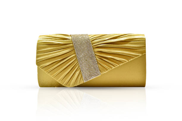 istock Golden clutch bag with diamonds isolated on white background with clipping path. 1219169136