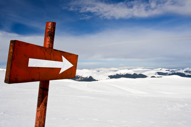 Winter Season - arrow sign stock photo