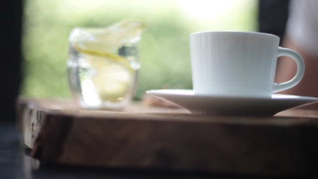 Cup of coffee with hand . stock video