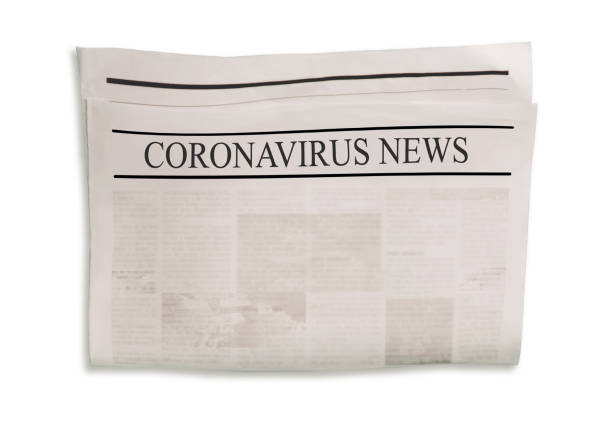 istock Coronavirus Covid-19 news. Newspapers with headlines on horizontal surface. 1219175330