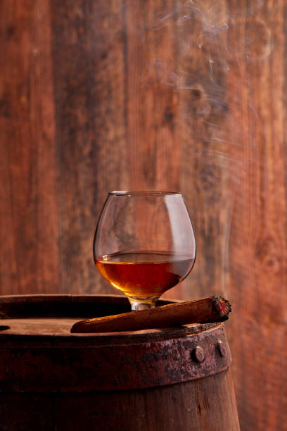 istock Glass of cognac and cigar 1219178487