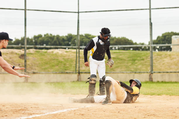 istock Sliding to base is what he does best 1219179164