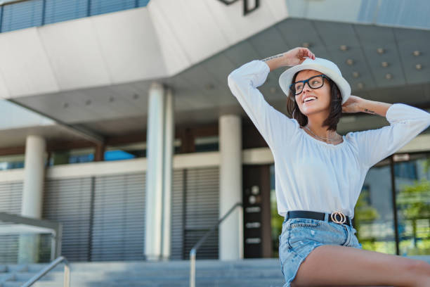 istock Feshionable young woman posing in the town 1219182809