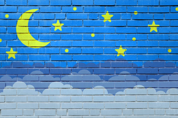 Moon and stars with clouds night dark blue brick wall mural graffiti street art copy space textured background. Baby, kids lullaby starry night sleep scene backdrop.
