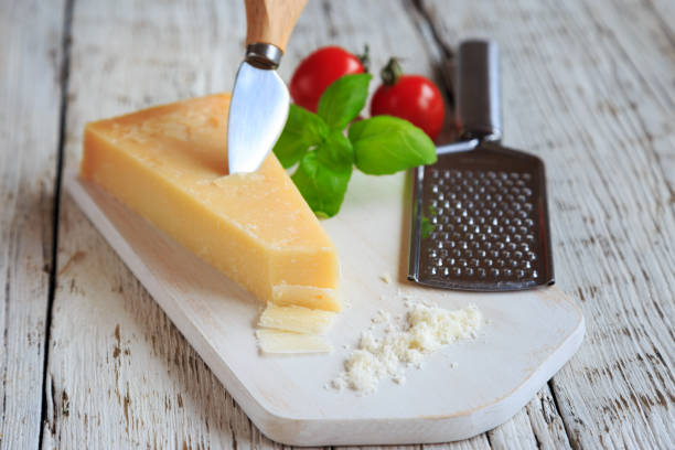 istock parmesan cheese on a wooden board 1219184246