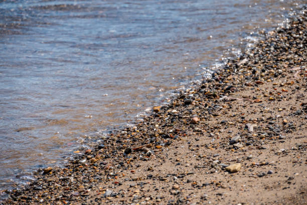 istock Soft Wave Of Blue Sea On Sandy Beach. Background - Summertime concept 1219185234