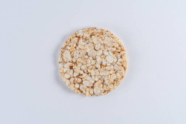 istock Crunchy rice cake on white table. Food background. 1219186343