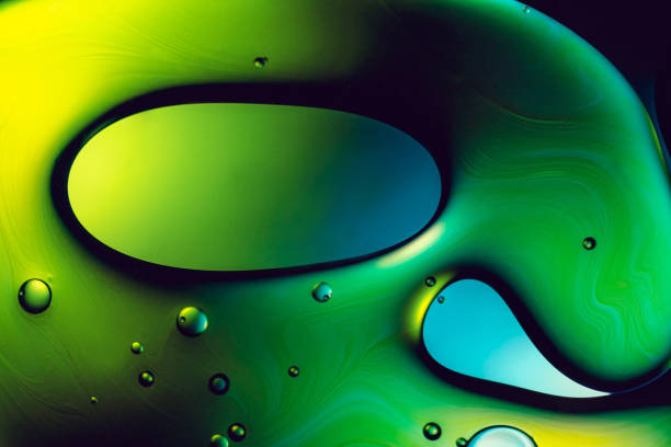 istock Abstract colourful oil drops in water 1219188764